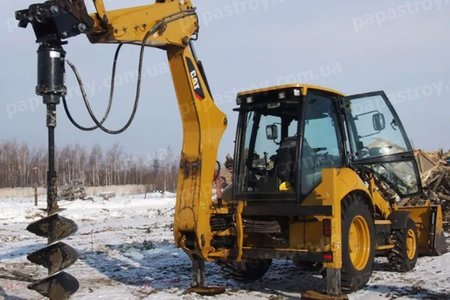 Экскаватор с ямобуром CAT